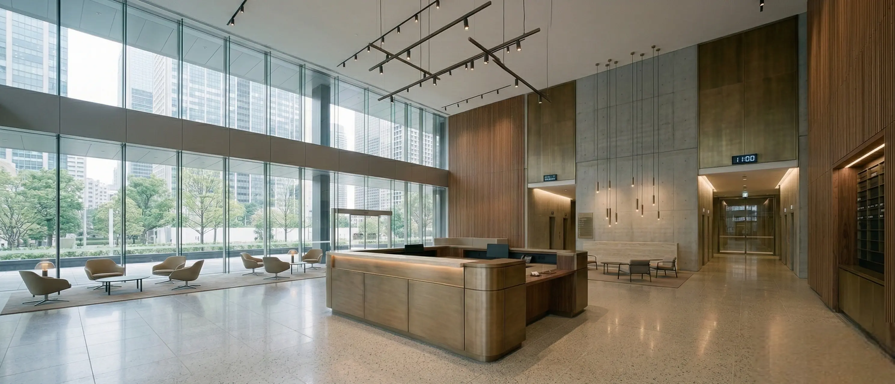 Custom brass reception desk with metal finish in a contemporary architectural lobby by Modulux